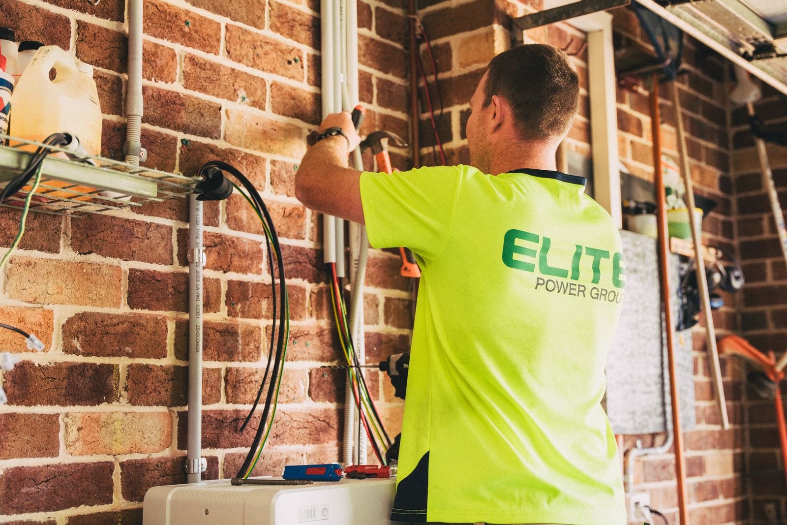 Electrician working on a solar battery installation